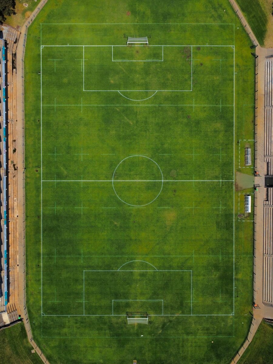an aerial view of a soccer field in a city